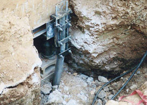 a bent, failed foundation push pier installed in Sherwood Park.