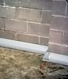 Our baseboard drain system installed on a corner in a Lloydminster basement.